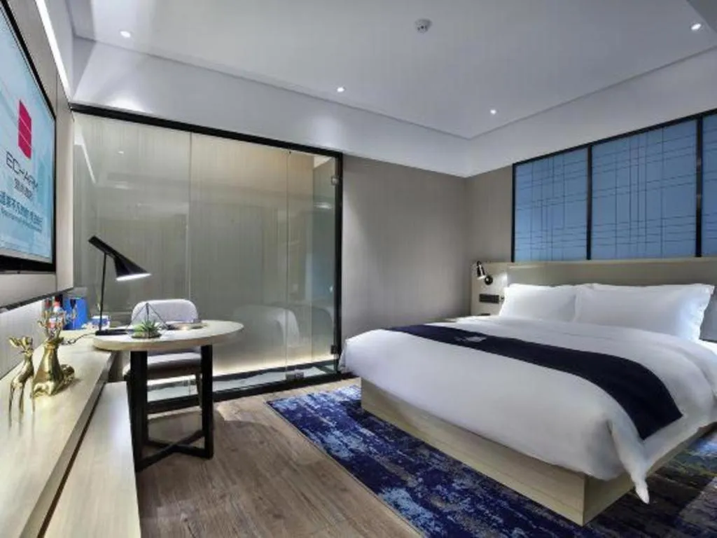 Bed in Echarm Hotel Guilin North High Speed Railway Station