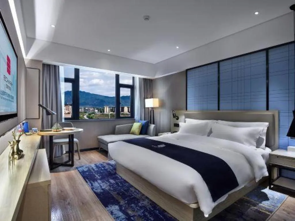 Bed in Echarm Hotel Guilin North High Speed Railway Station