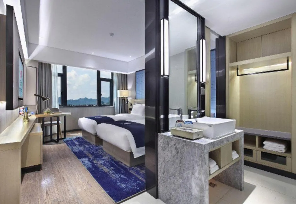 Bed in Echarm Hotel Guilin North High Speed Railway Station