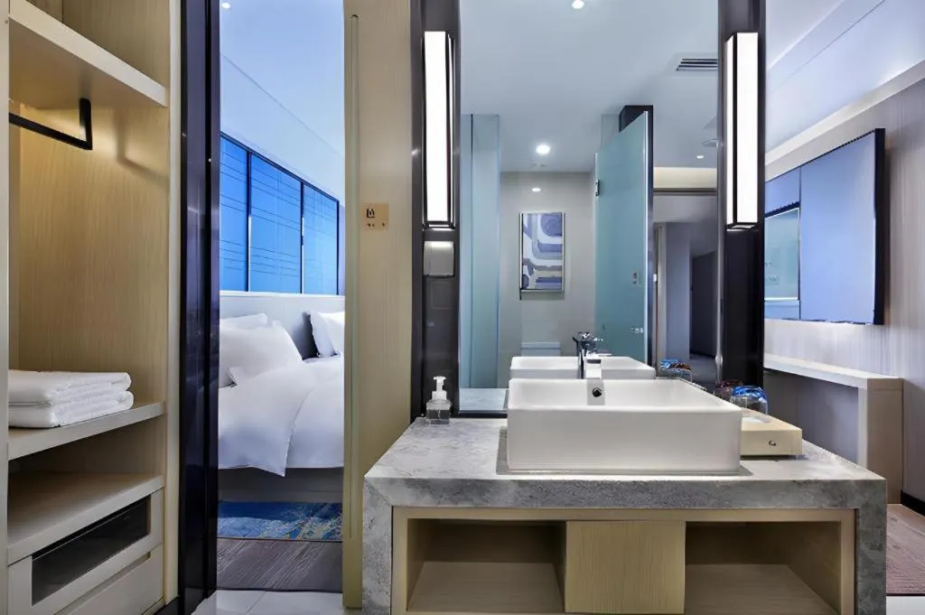 Bed in Echarm Hotel Guilin North High Speed Railway Station