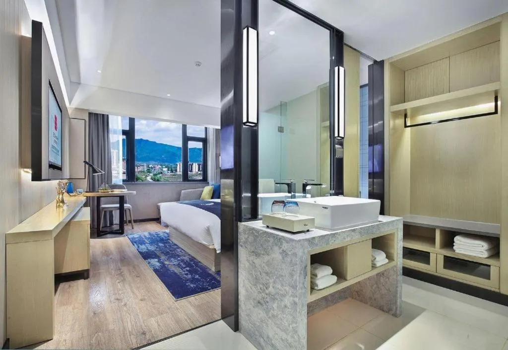 Bed in Echarm Hotel Guilin North High Speed Railway Station