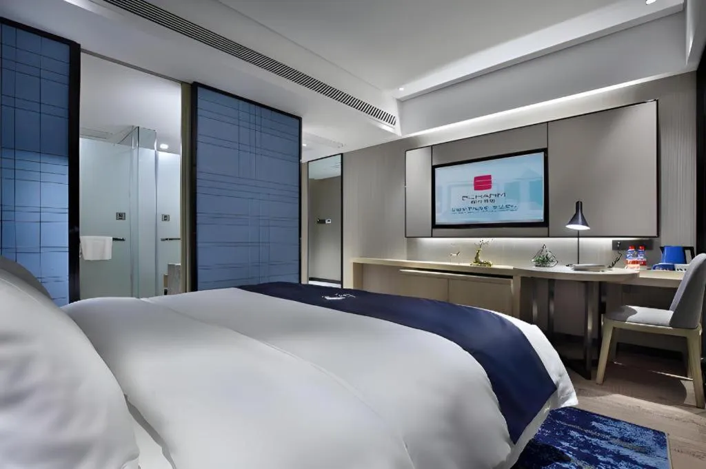 Bed in Echarm Hotel Guilin North High Speed Railway Station