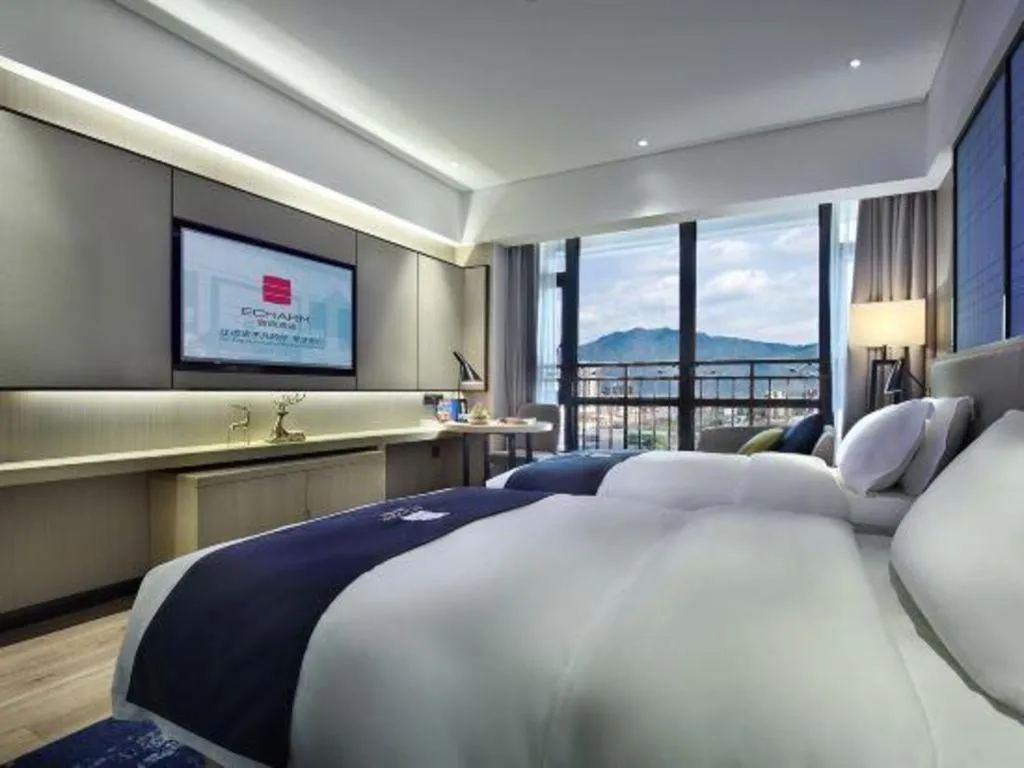 Bed in Echarm Hotel Guilin North High Speed Railway Station