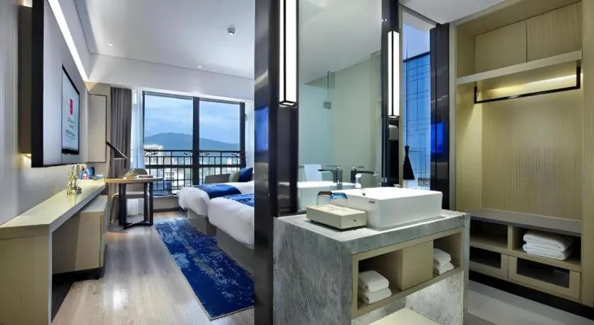 Bed in Echarm Hotel Guilin North High Speed Railway Station