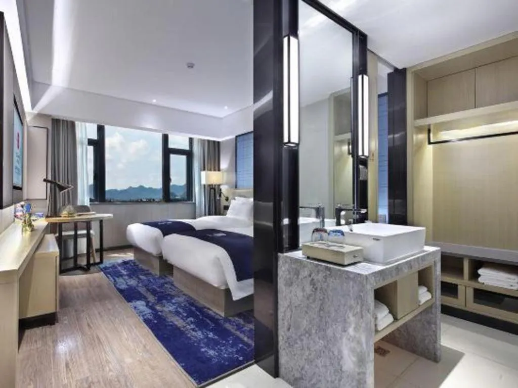 Bed in Echarm Hotel Guilin North High Speed Railway Station