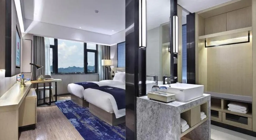 Bed in Echarm Hotel Guilin North High Speed Railway Station