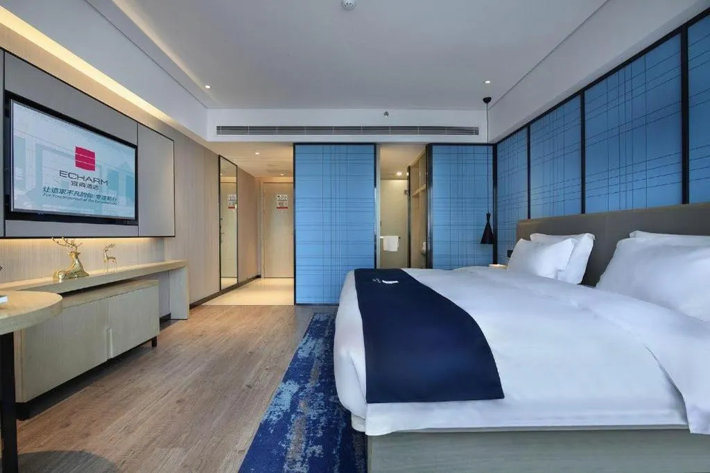 Bed in Echarm Hotel Guilin North High Speed Railway Station