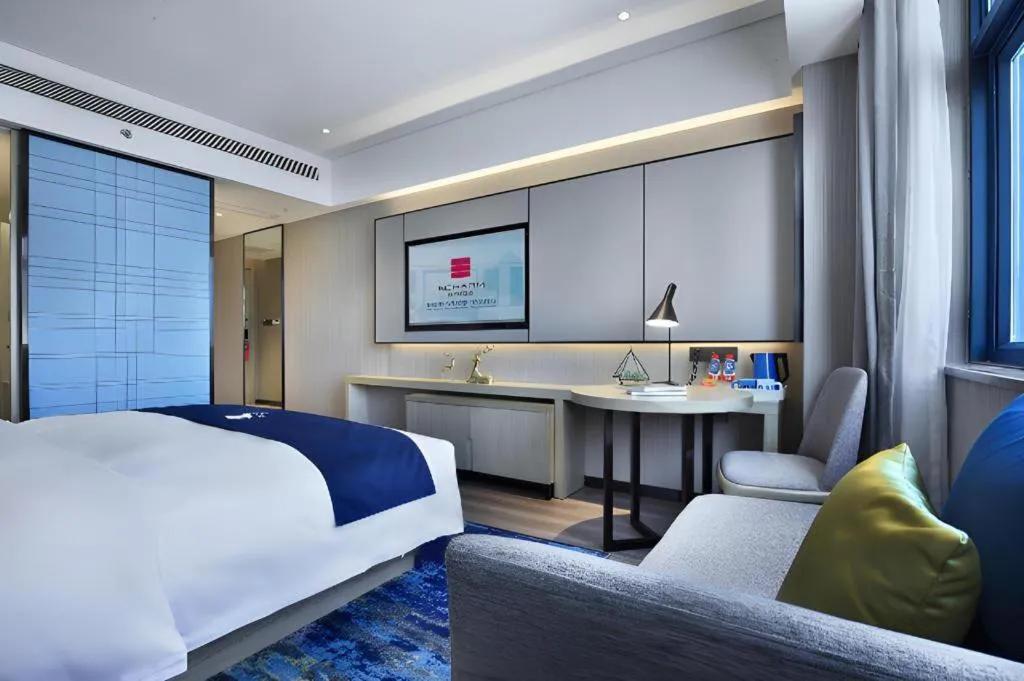 Bed in Echarm Hotel Guilin North High Speed Railway Station