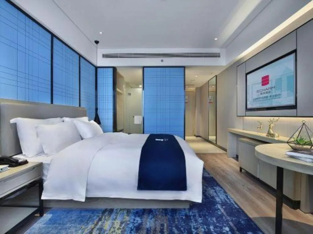 Bed in Echarm Hotel Guilin North High Speed Railway Station