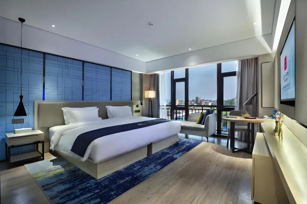 Bed in Echarm Hotel Guilin North High Speed Railway Station