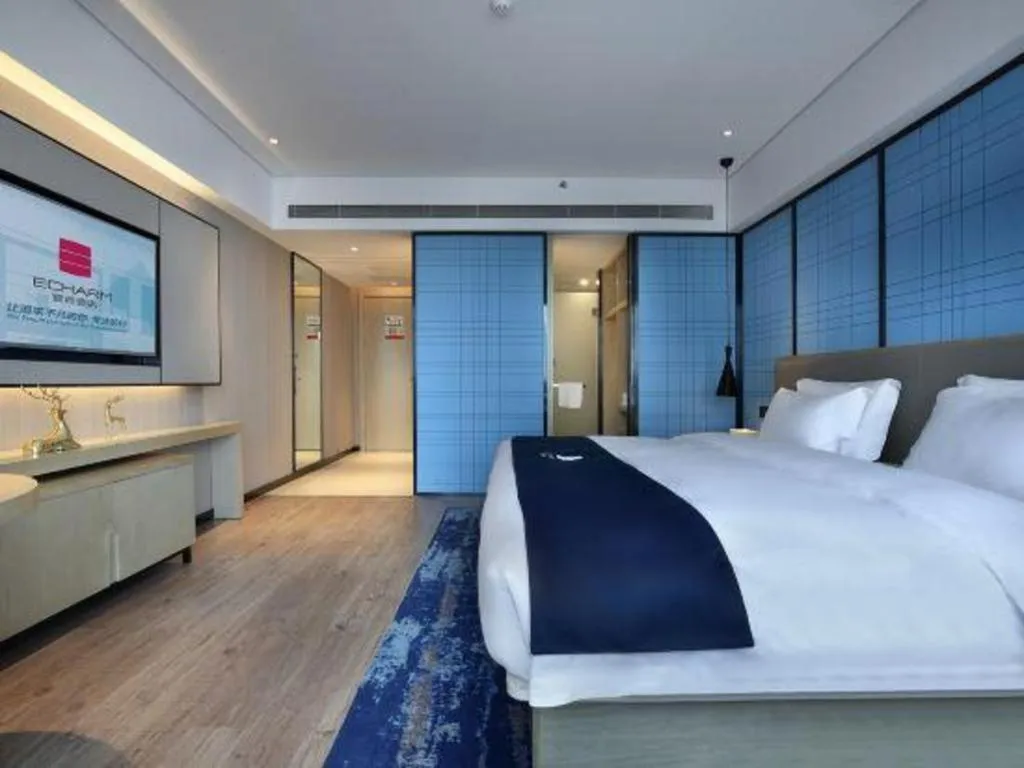 Bed in Echarm Hotel Guilin North High Speed Railway Station