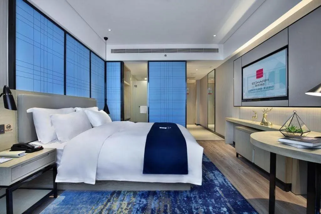 Bed in Echarm Hotel Guilin North High Speed Railway Station