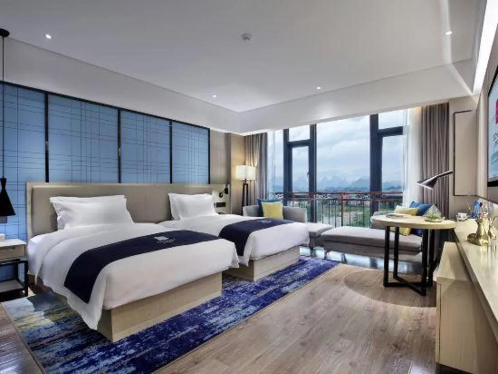 Bed in Echarm Hotel Guilin North High Speed Railway Station