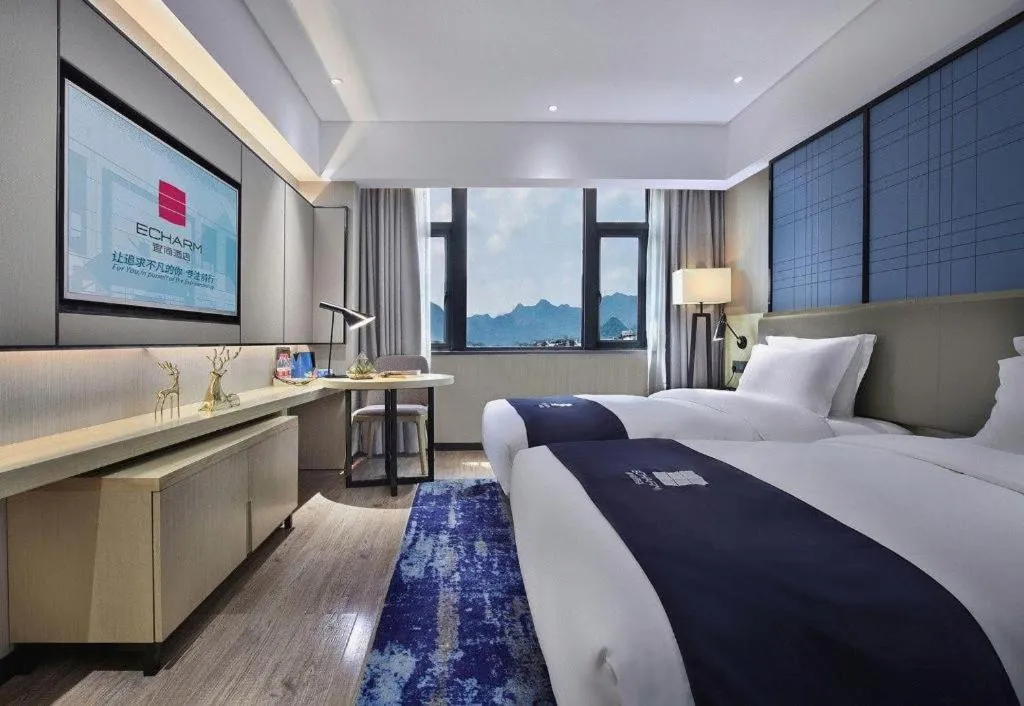 Bed in Echarm Hotel Guilin North High Speed Railway Station