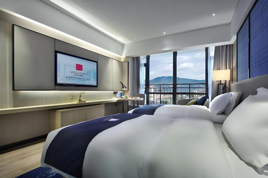 Bed in Echarm Hotel Guilin North High Speed Railway Station