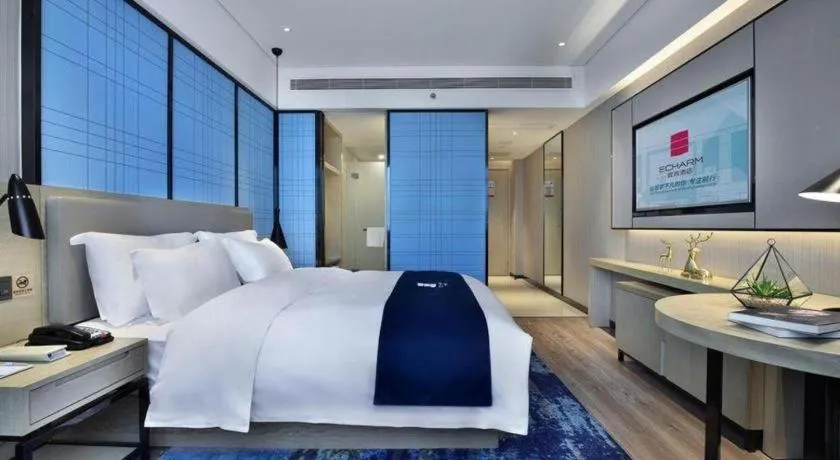 Bed in Echarm Hotel Guilin North High Speed Railway Station