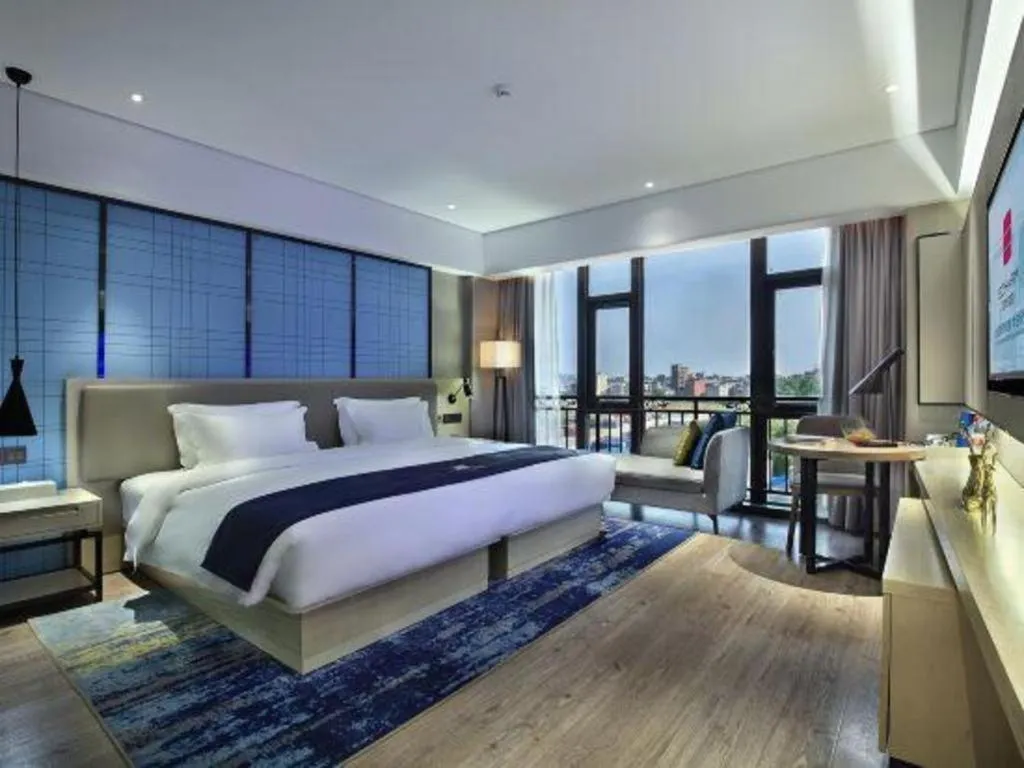 Bed in Echarm Hotel Guilin North High Speed Railway Station