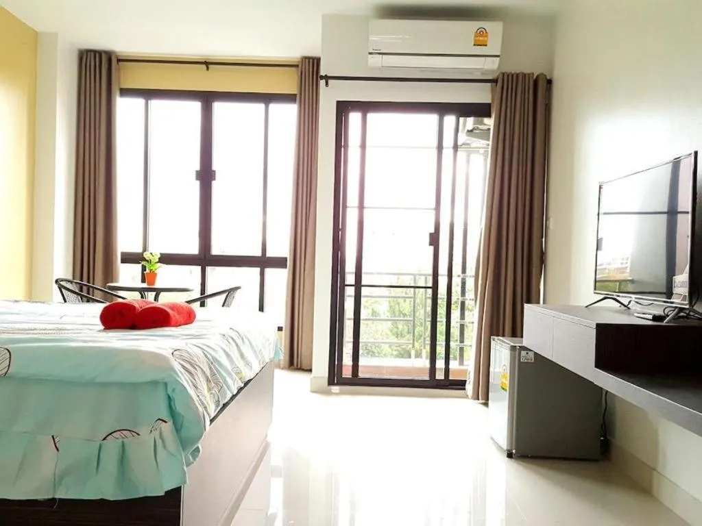 Bed in THE ALL 24 Luxury Residence