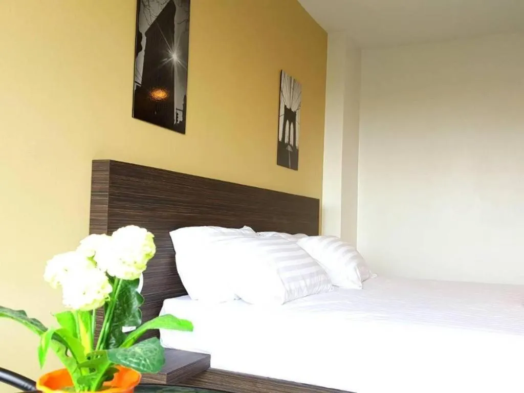 Bed in THE ALL 24 Luxury Residence