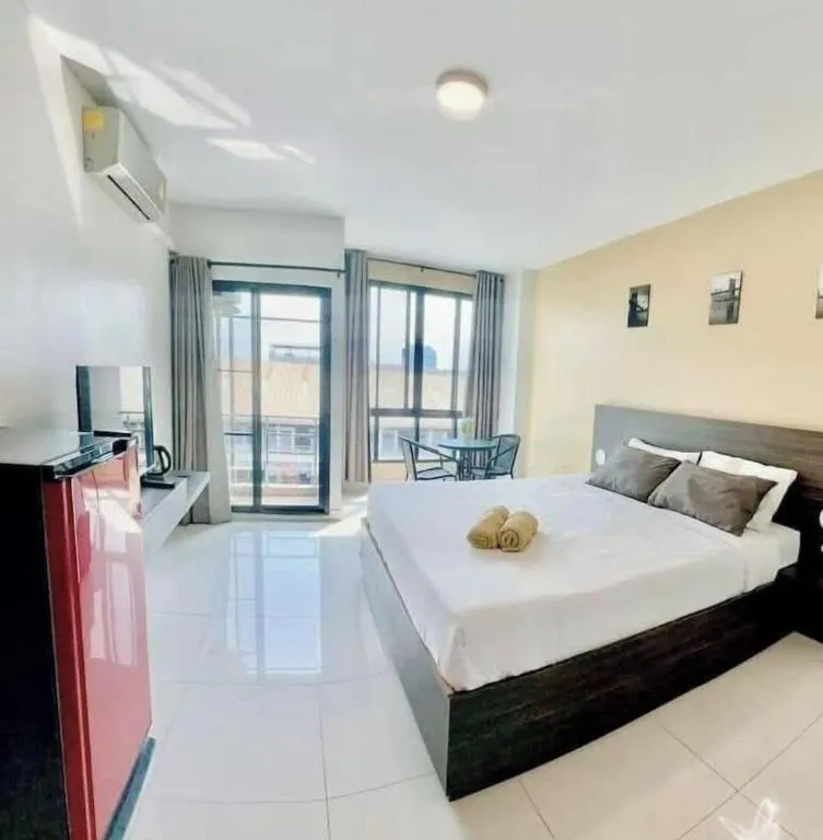 Bed in THE ALL 24 Luxury Residence