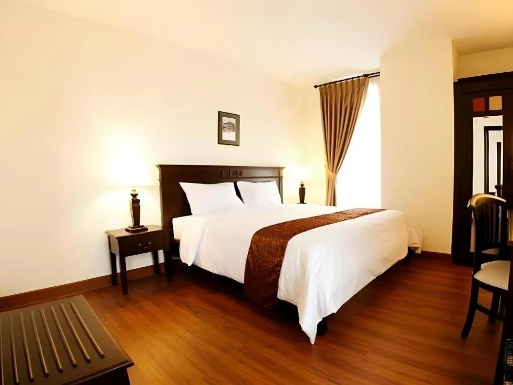 Bed in Colonial Hotel Makassar