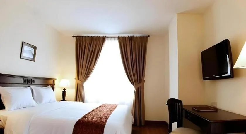 Bed in Colonial Hotel Makassar