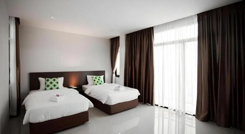 Bed in The Viewpoint Hotel