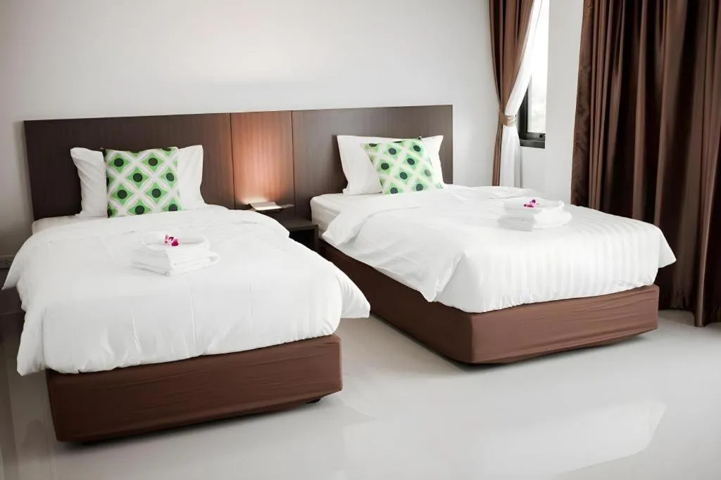 Bed in The Viewpoint Hotel