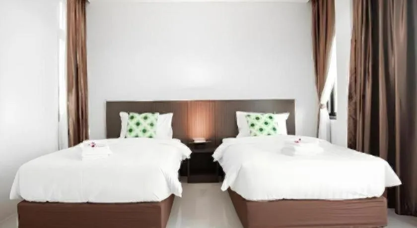 Bed in The Viewpoint Hotel