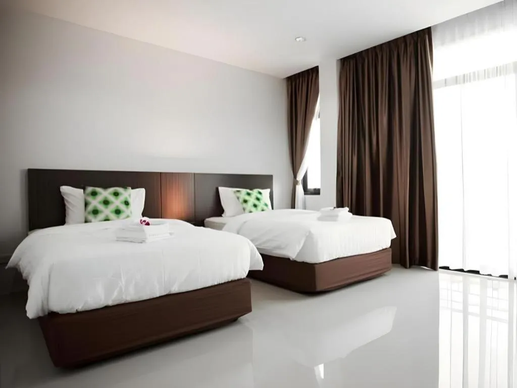 Bed in The Viewpoint Hotel