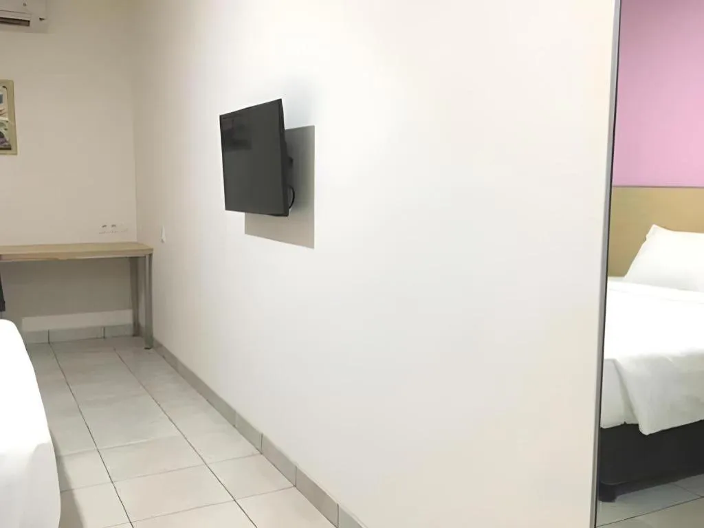 Bed in I&M Hotel Billiard