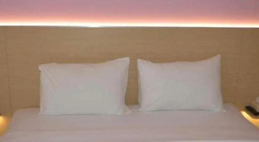 Bed in I&M Hotel Billiard