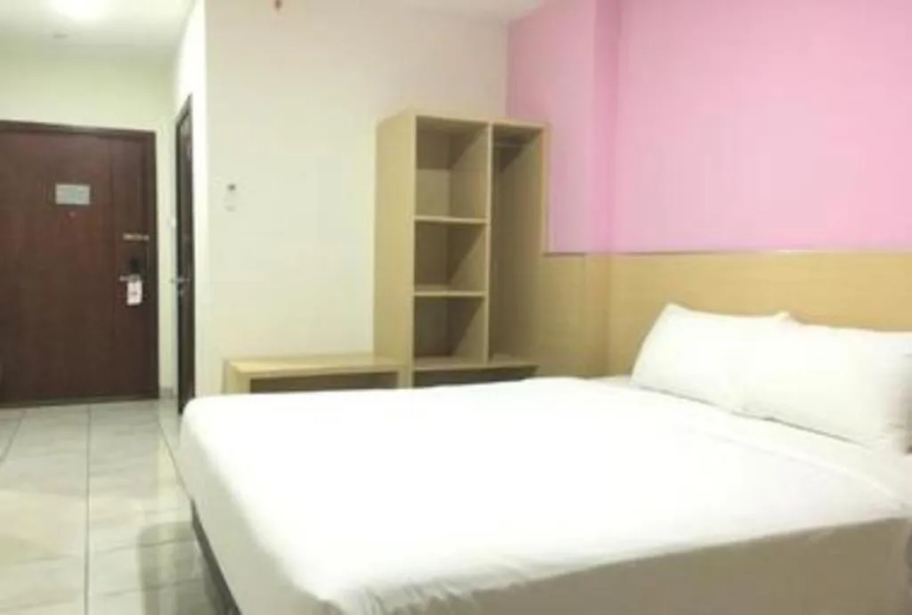 Bed in I&M Hotel Billiard