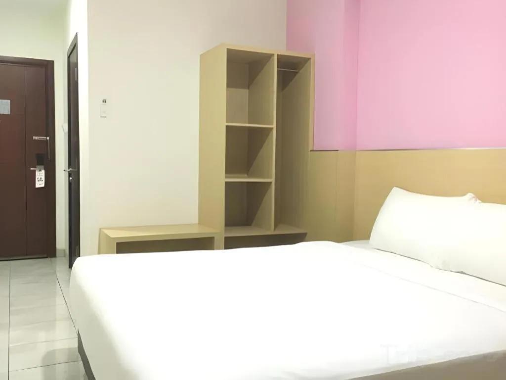 Bed in I&M Hotel Billiard