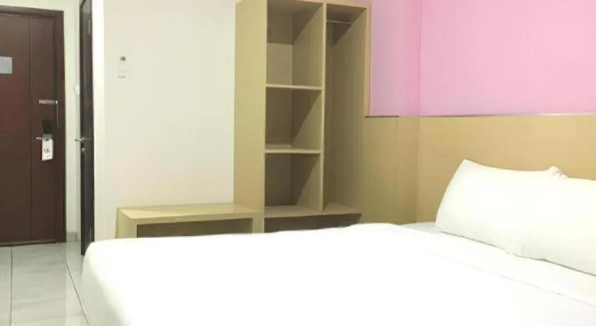 Bed in I&M Hotel Billiard