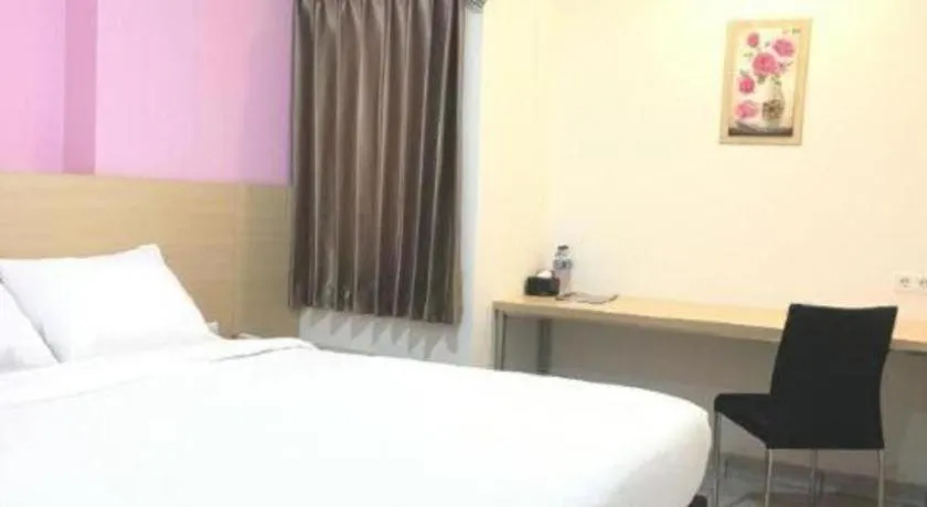 Bed in I&M Hotel Billiard