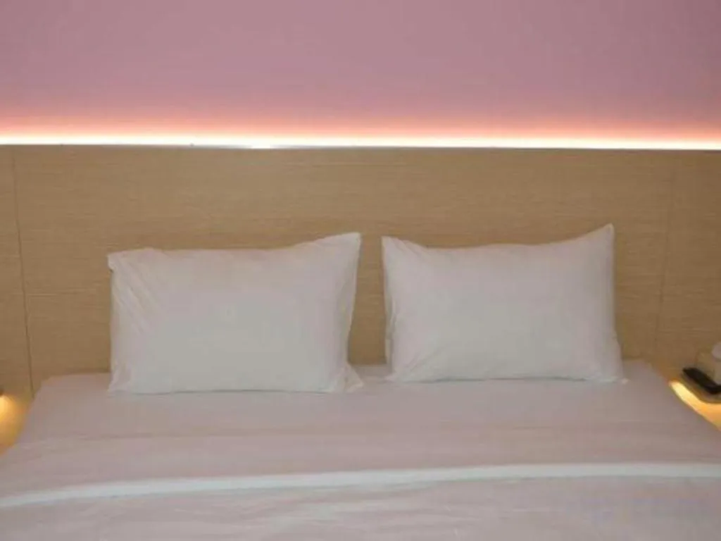 Bed in I&M Hotel Billiard