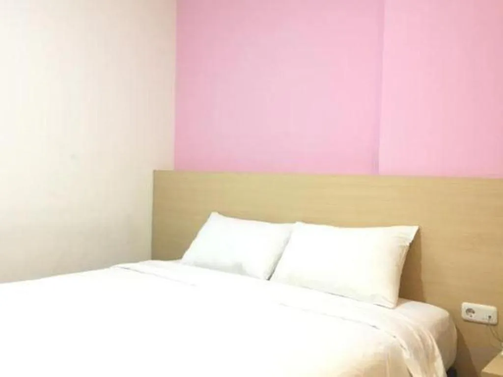 Bed in I&M Hotel Billiard