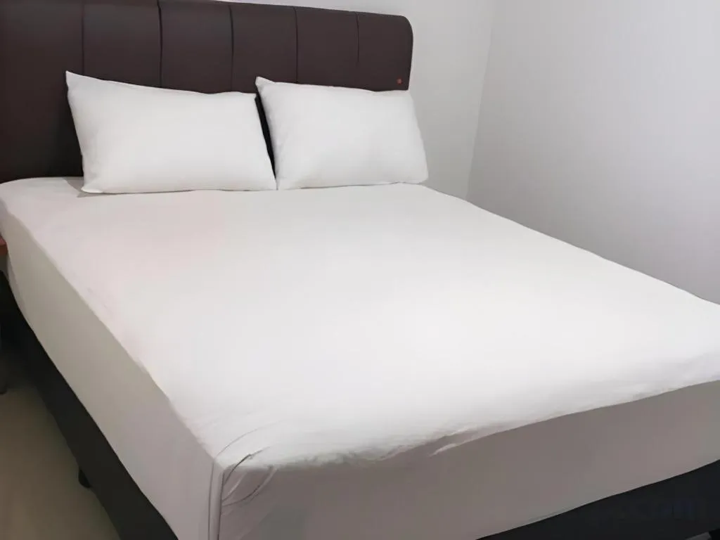 Bed in I&M Hotel Billiard