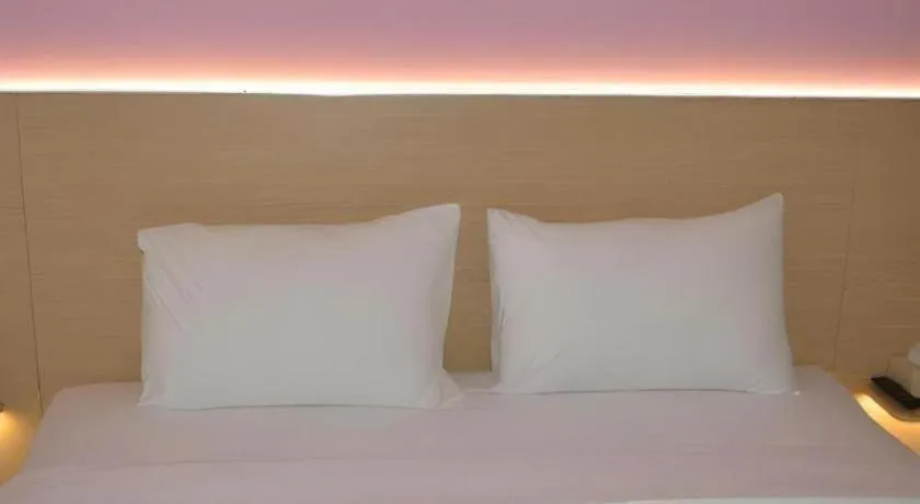 Bed in I&M Hotel Billiard