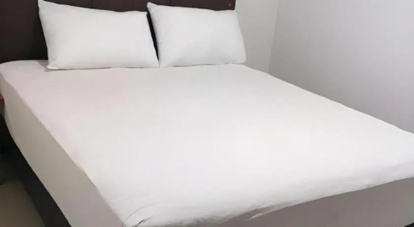 Bed in I&M Hotel Billiard