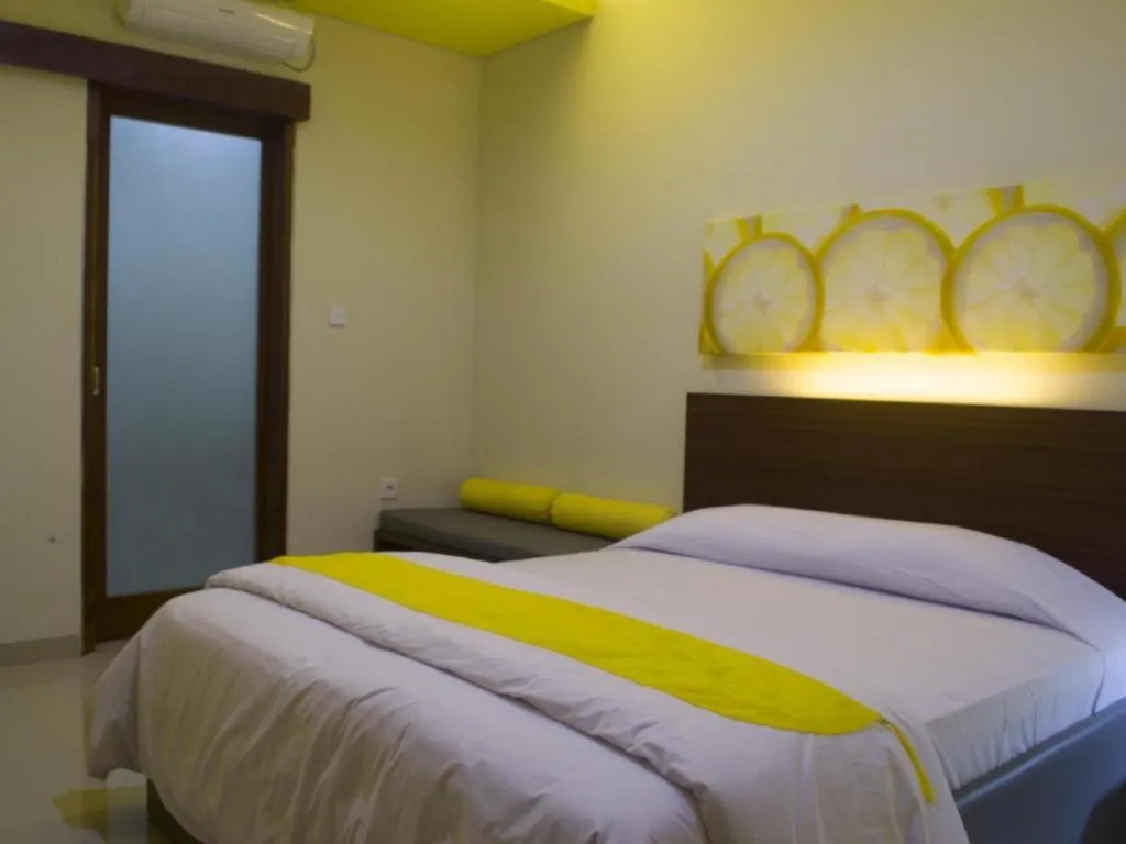 Bed in De Lemon Gatsu Hotel