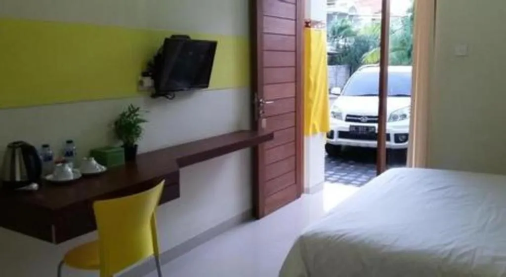 Bed in De Lemon Gatsu Hotel