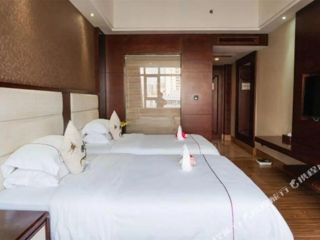 Bed in Haikou Kai Wei Hotel