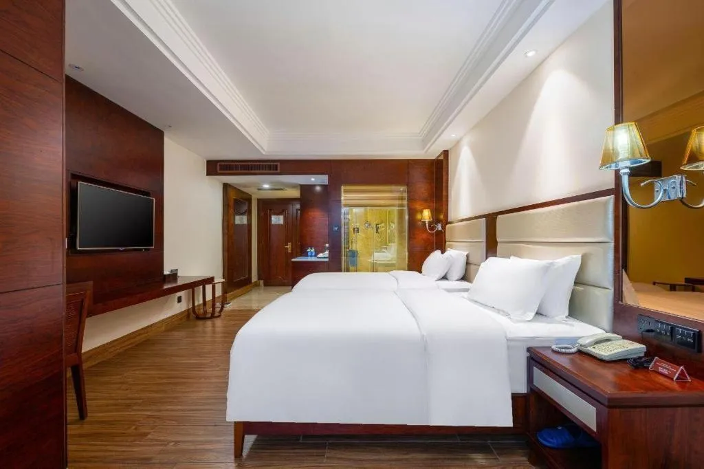 Bed in Haikou Kai Wei Hotel