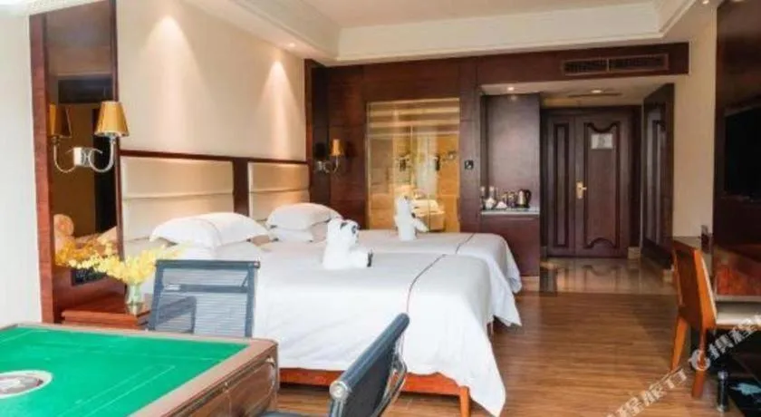 Bed in Haikou Kai Wei Hotel