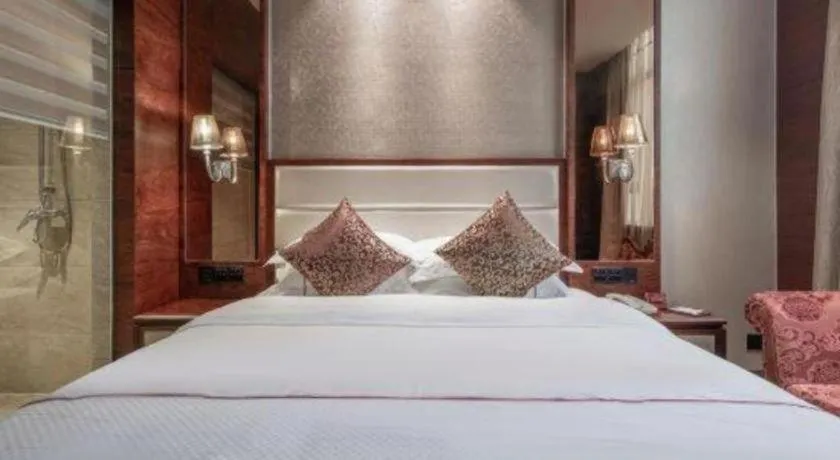 Bed in Haikou Kai Wei Hotel