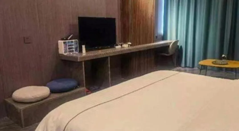 Bed in Haikou Kai Wei Hotel