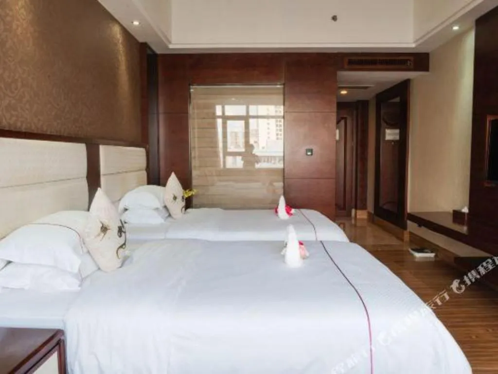 Bed in Haikou Kai Wei Hotel