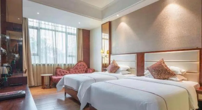 Bed in Haikou Kai Wei Hotel